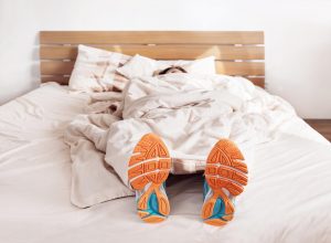 girl-in-bed-with-runners